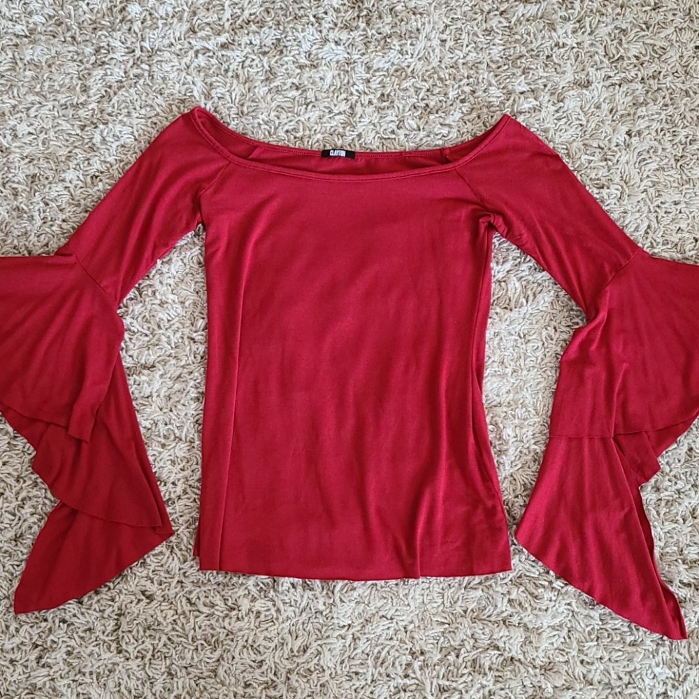 Fun and playful Clayton top. Size S.
